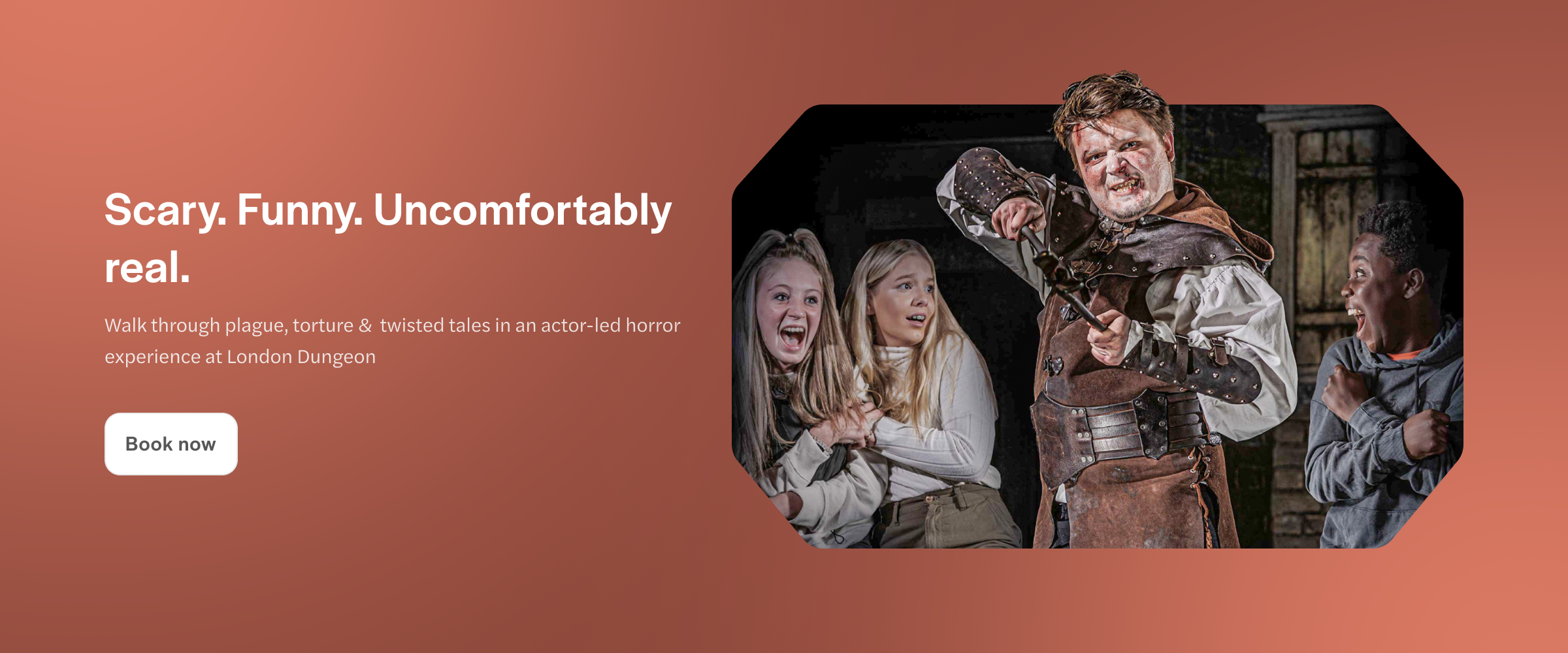 Actor-led horror scene at London Dungeon with frightened visitors.